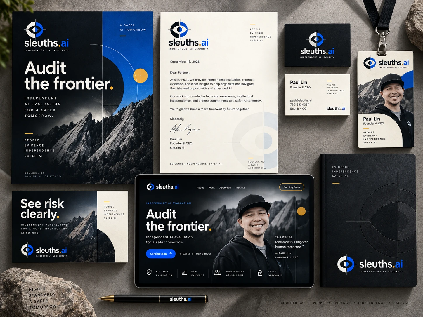 sleuths.ai brand composition featuring independent AI security, mountain imagery, and black, ivory, blue and gold stationery.